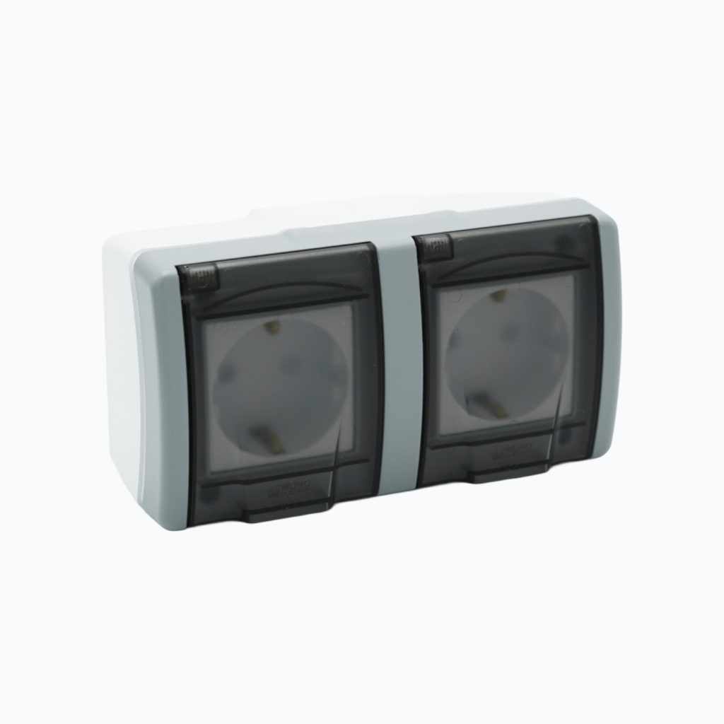 Socket outlet with earth contact and child protection + socket outlet with earth contact